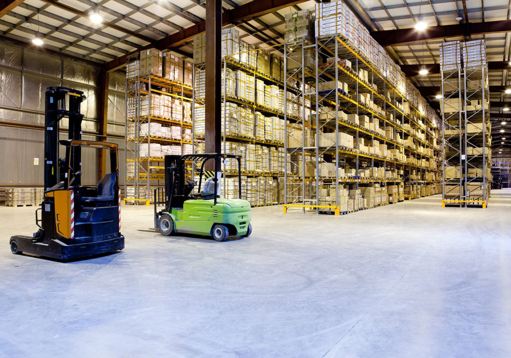 forklifts in industrial warehouse